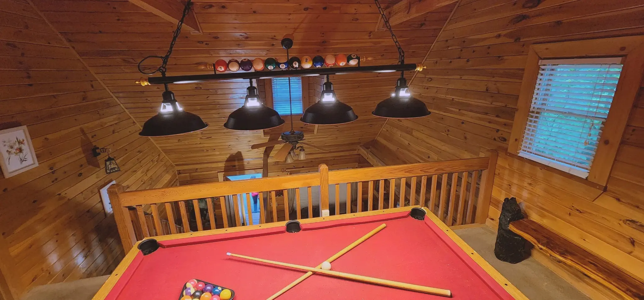 Vaulted loft game area with a pool table at Heavenly Heights