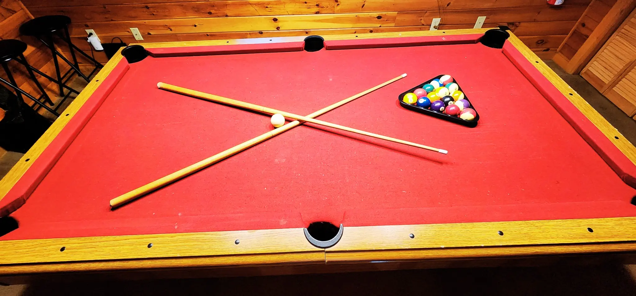 Red-felt pool table at Heavenly Heights