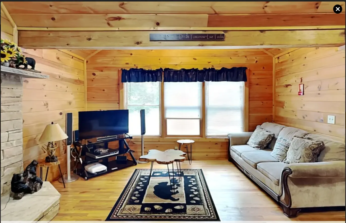 Living room with smart TV and fireplace at Morning Mist